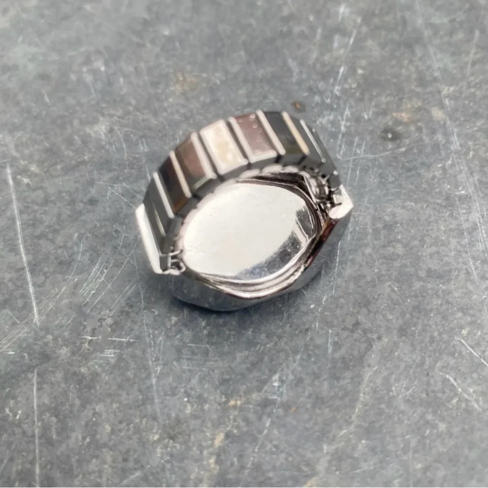 Silver and Red Wearable Tech Ring
